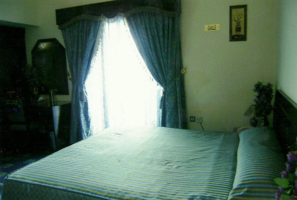 Marina Hotel Mutrah Habitación foto